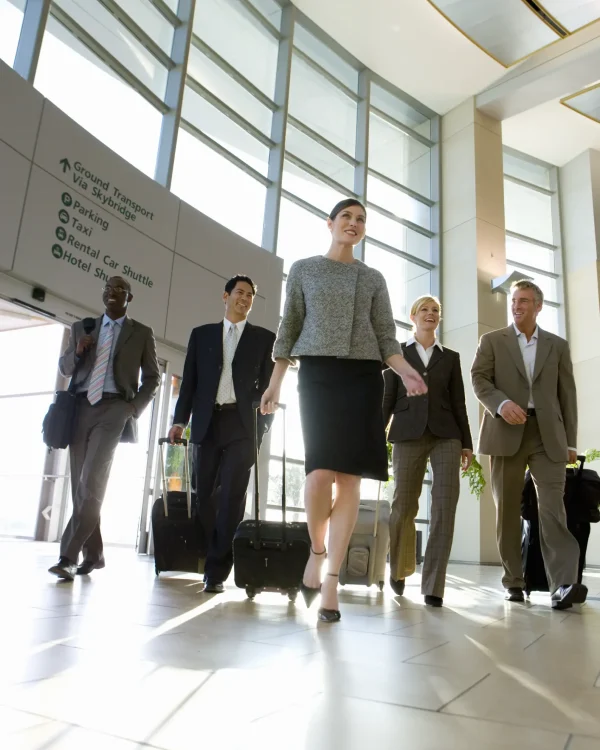 businesspeople-walking-in-airport-2026-03-26-03-43-22-utc