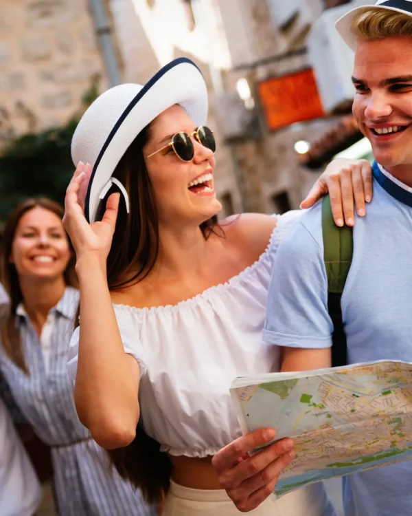 friends-explore-city-with-map-on-vacation-2026-03-20-03-28-04-utc