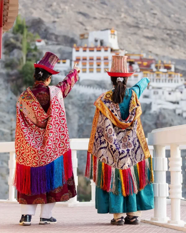 two-women-in-vibrant-traditional-leh-attire-point-2026-03-25-09-40-36-utc